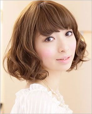 烫过的梨花头怎么打理 长发梨花卷图片